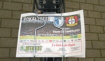 Fahrradgepäckträger mit Stadionheft vom FCM - Leverkusen.