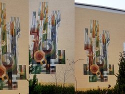 Fröhner-Wandbild an der Seitenwand der Ernst-Wille-Schule.