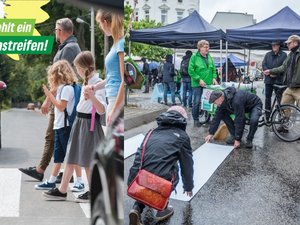 Bild von der Zebrastreifenaktion 2019 mit der Forderung Hier gehört ein Zebrastreifen hin.